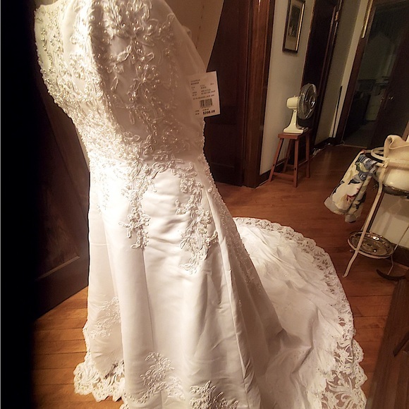 New with tags, Wedding Gown David’s Bridal, bustle was added. - Picture 9 of 9